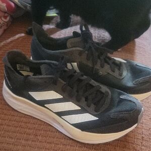 Adidas Black and White Athletic Shoes with Cushioned Sole